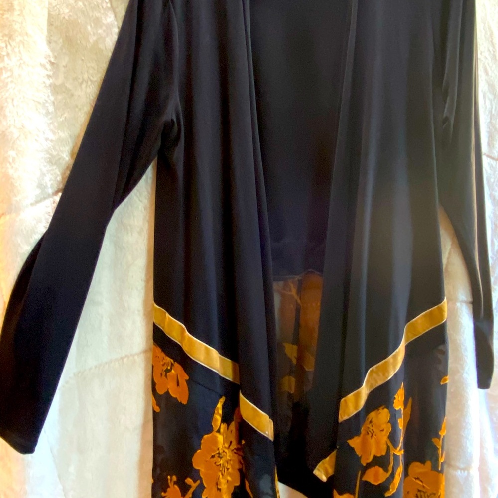 Soft dressing cardigan throw over with sleeves.